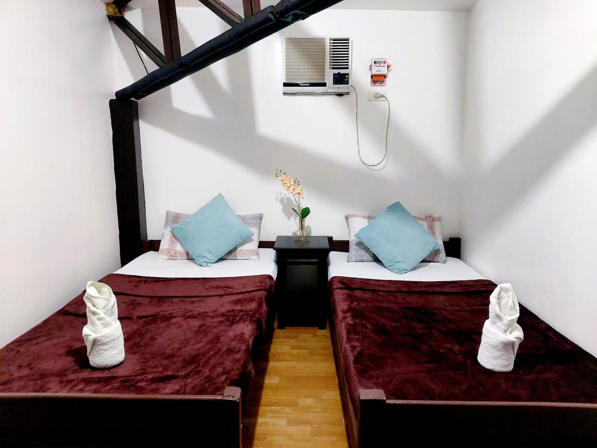 Amancio'S Balai - Near The Airport, City Center! Puerto Princesa ห้อง รูปภาพ